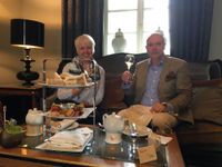 A Royal Tea Time - The Baron &amp; Baroness take a glass of Champagne